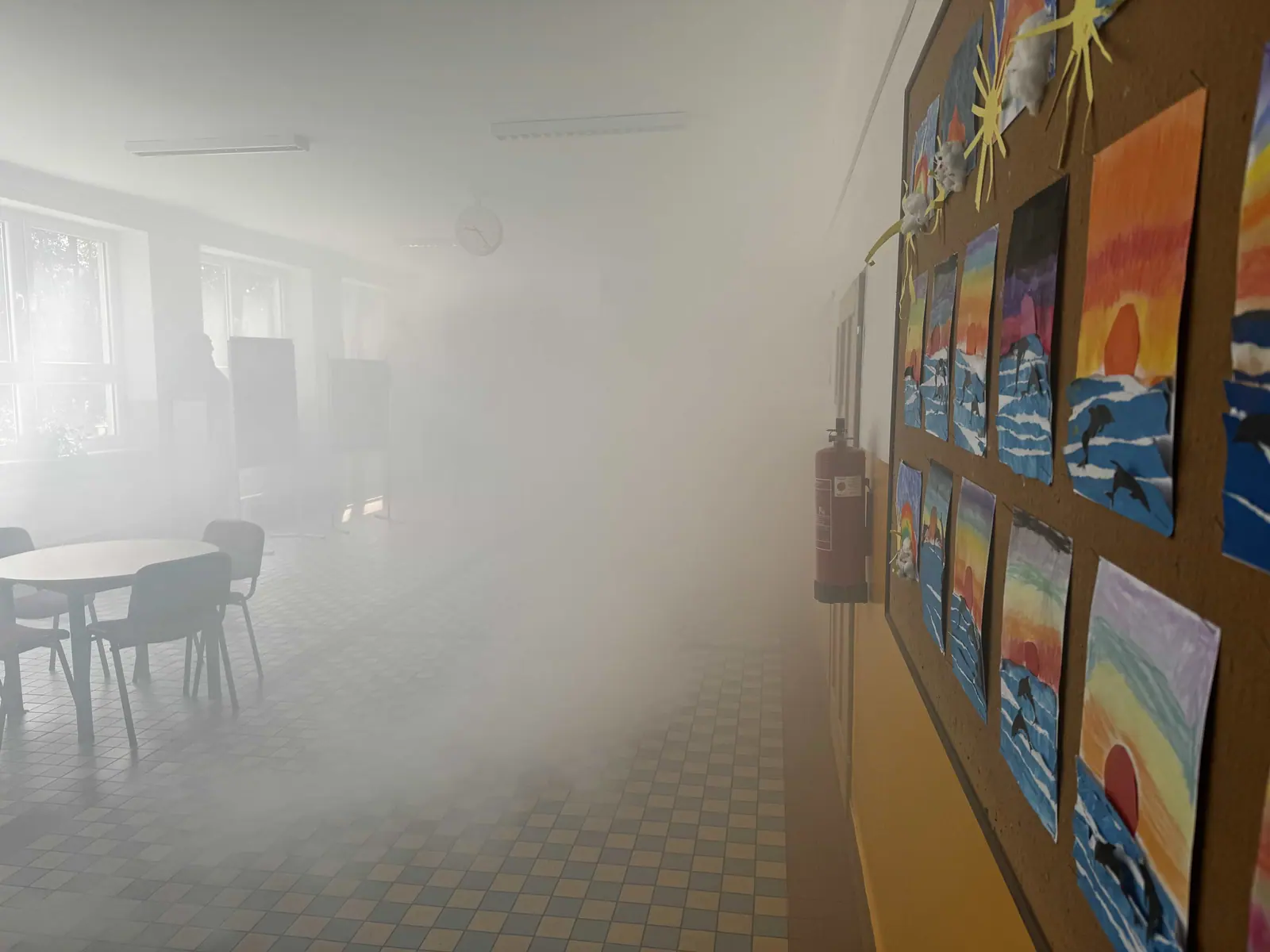 A smoke-filled corridor during the evacuation drill
