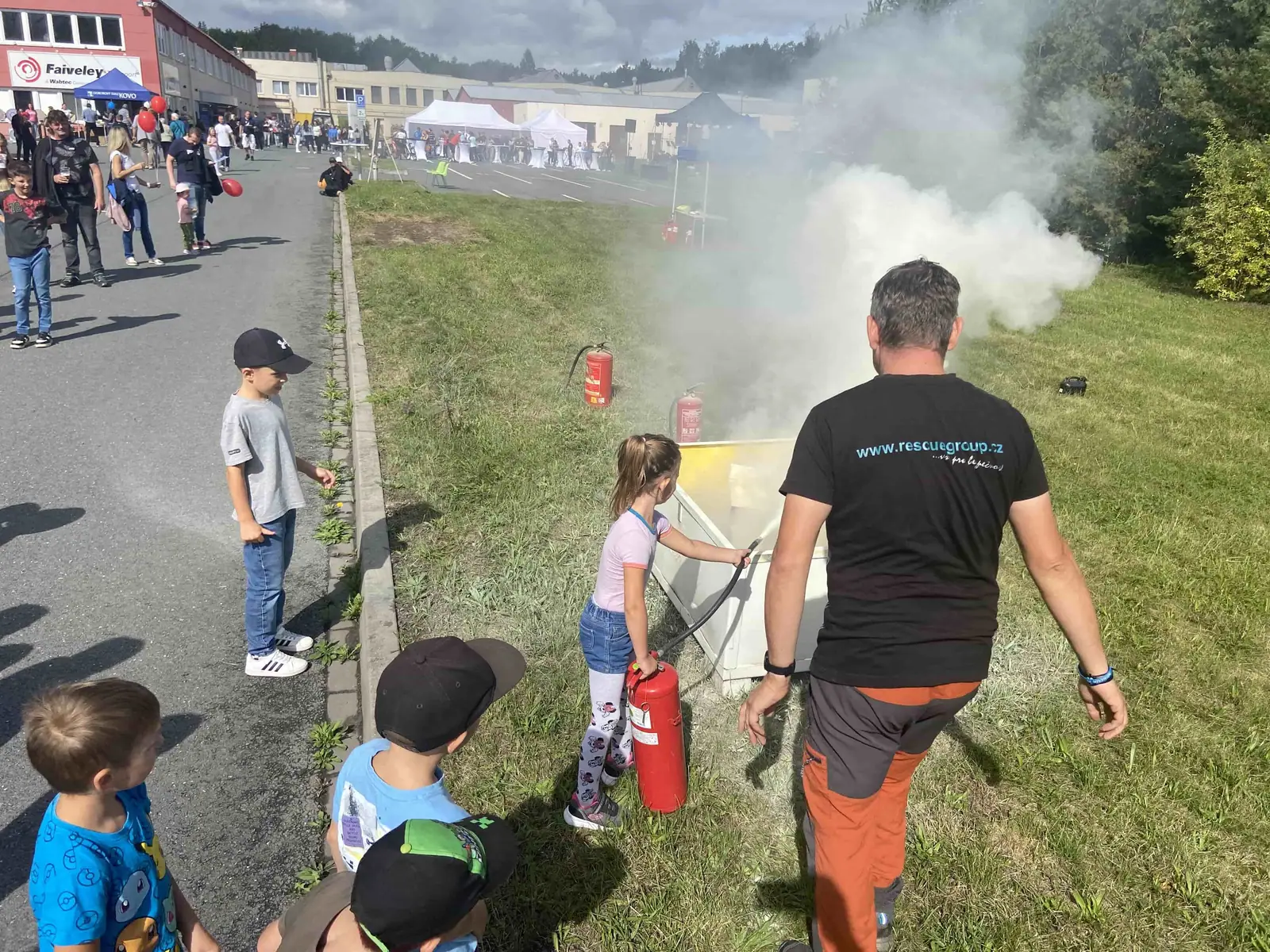 Children putting out a real fire
