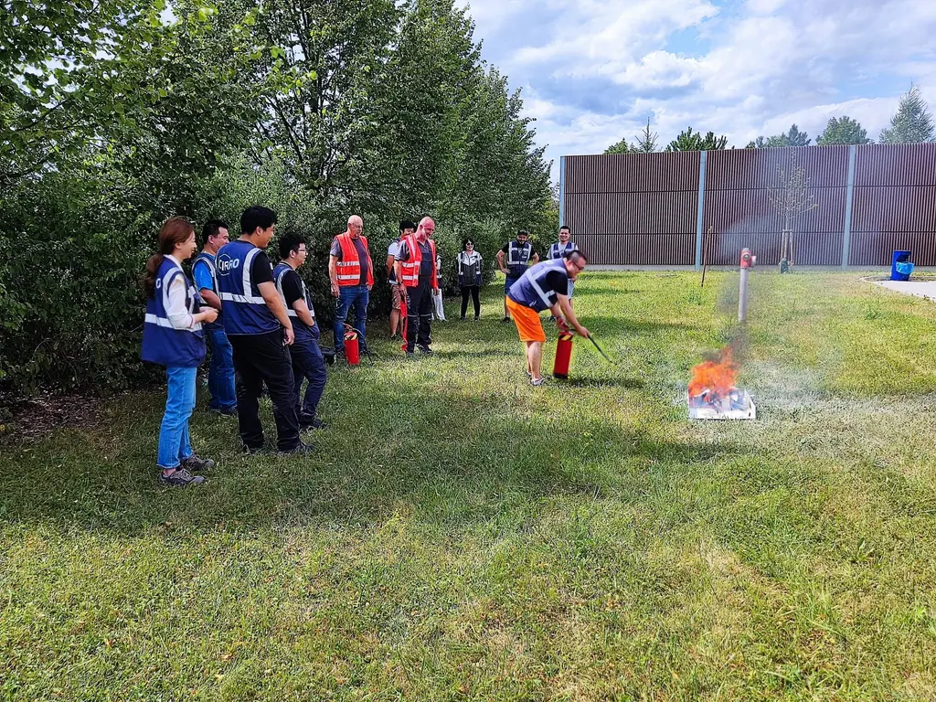 Firefighting practice – one of the participants putting out the fire
